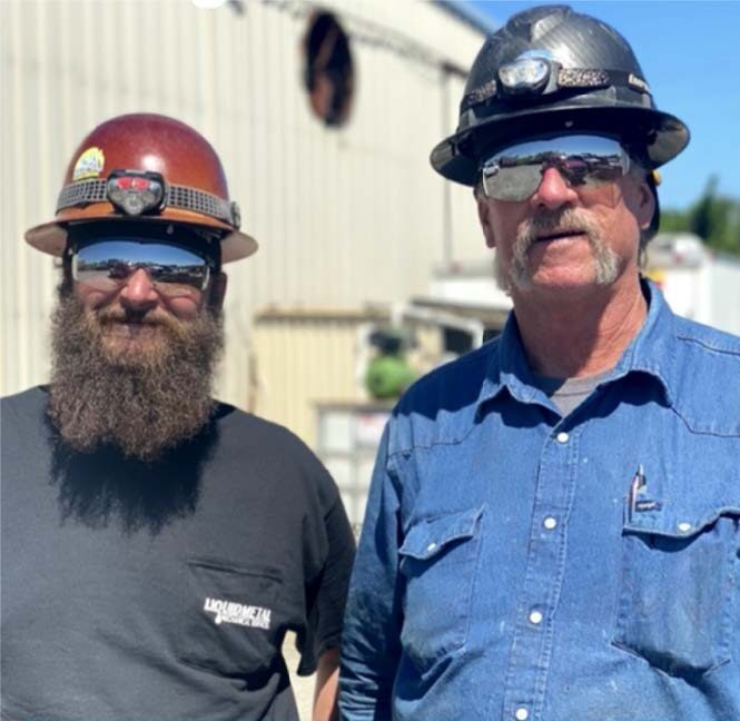 two welders and mechanical contractors