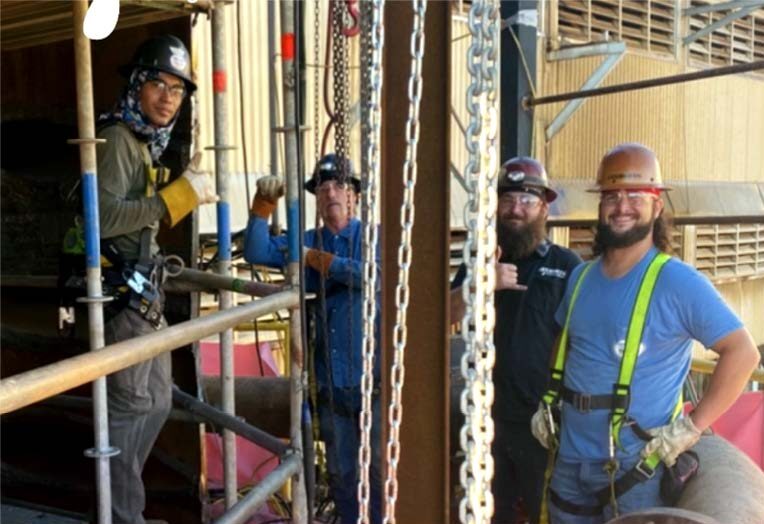 Liquid Metal Employees Smiling at a Jobsite